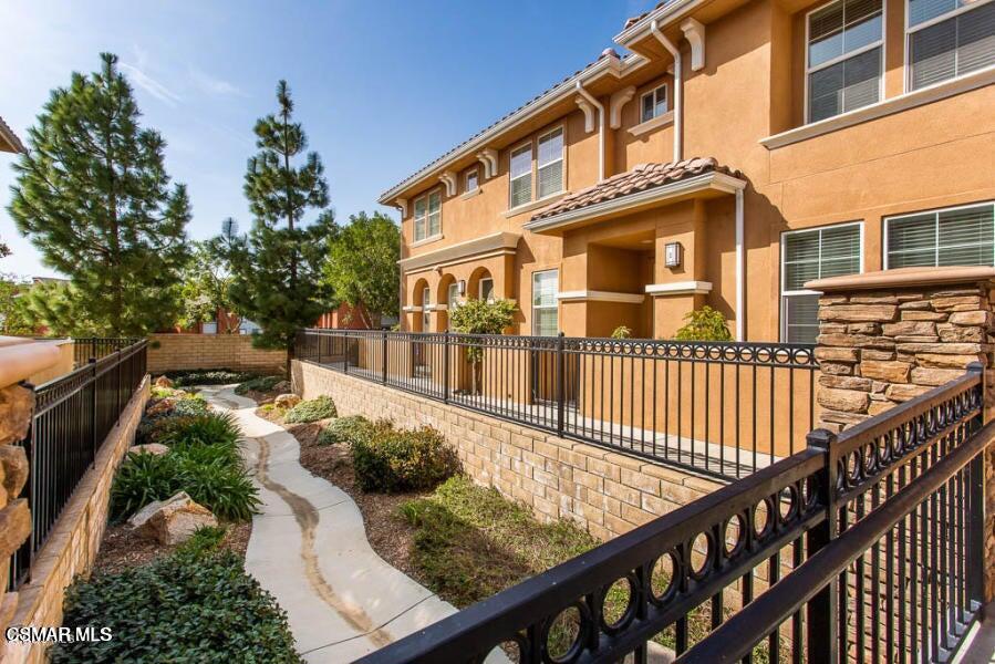 1654 Heywood Street, Unit D Simi Valley, CA 93065 - Photo 2 of 14 a view of a house with wooden fence