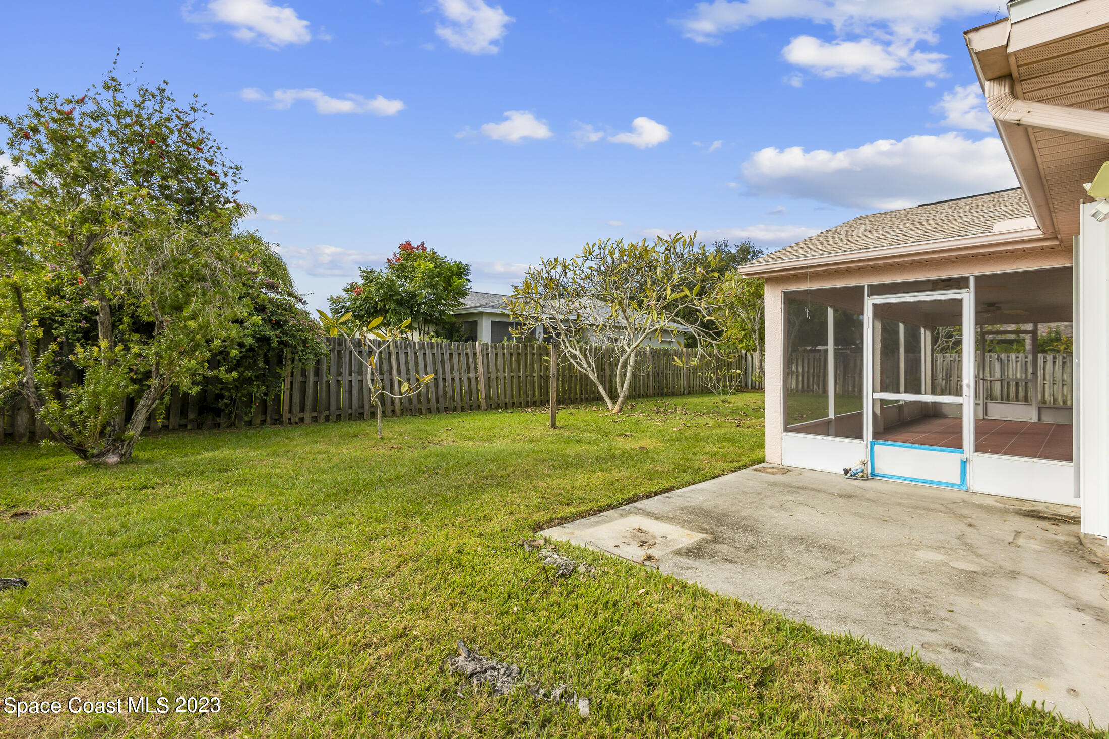 813 Cebu Place Melbourne, FL 32940 - Photo 24 of 25 a view of a house with a yard