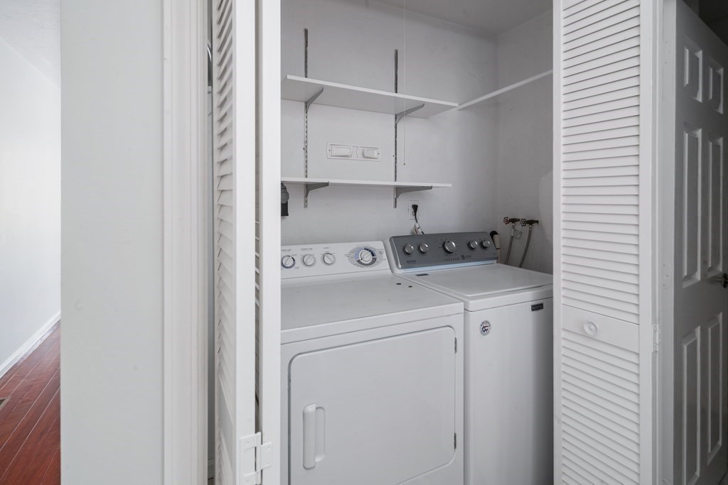 68 Regent Circle, Unit 68 Brookline, MA 02445 - Photo 14 of 21 a utility room with dryer and washer