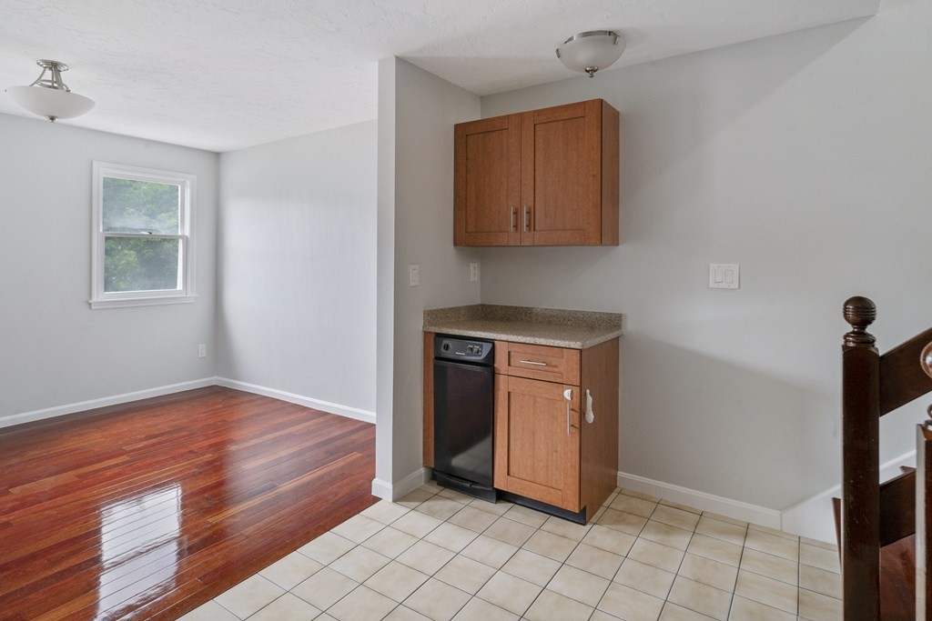 68 Regent Circle, Unit 68 Brookline, MA 02445 - Photo 3 of 21 a view of an entryway with kitchen