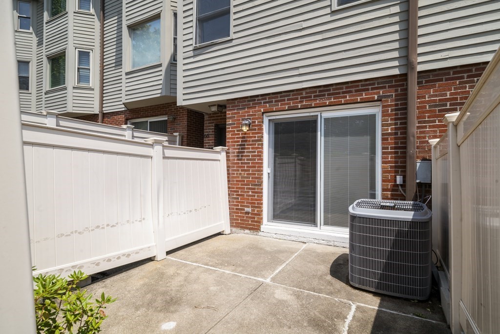 68 Regent Circle, Unit 68 Brookline, MA 02445 - Photo 5 of 21 a front view of a house with entryway