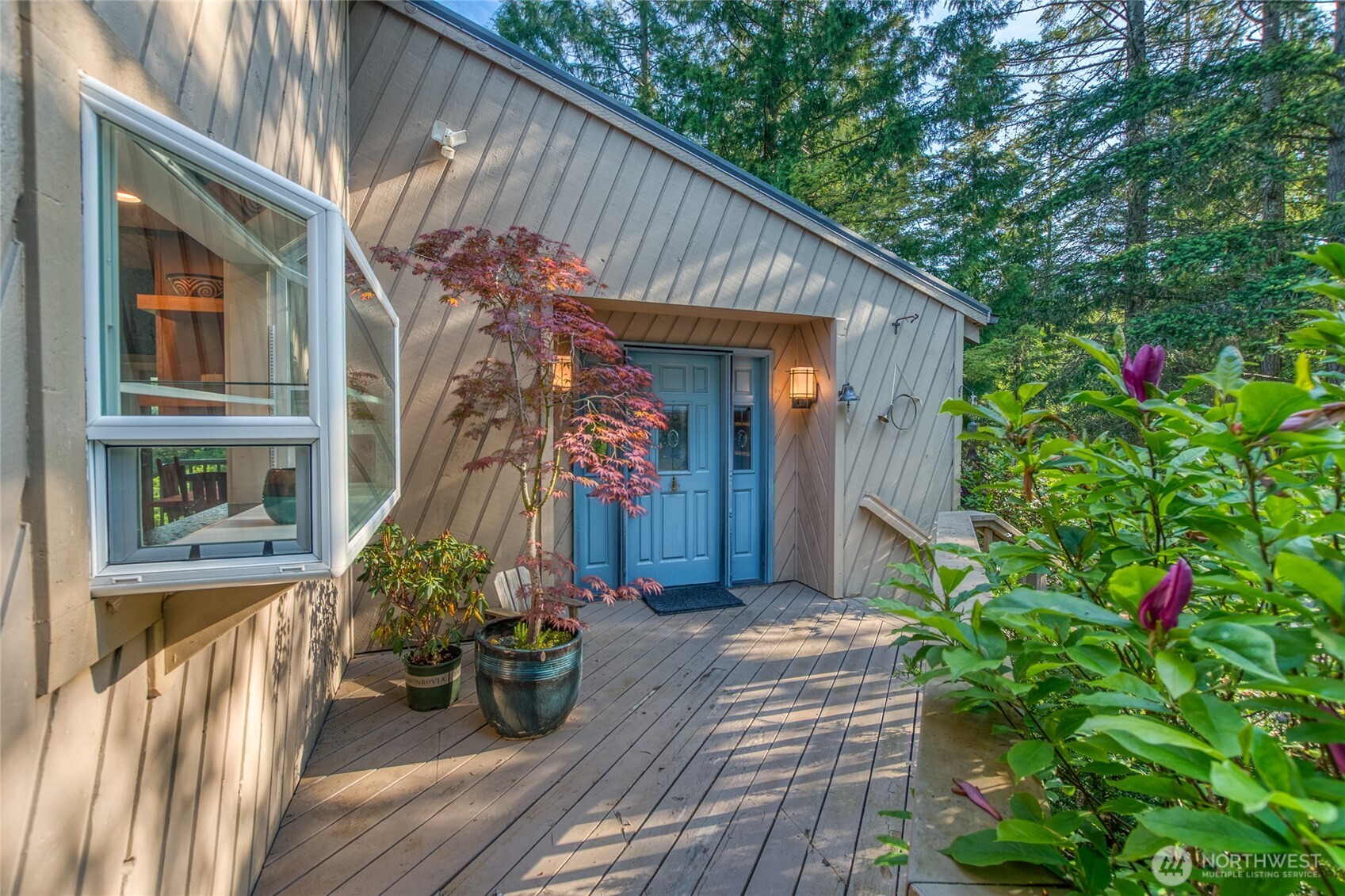 402 Cayou Valley Road Orcas Island, WA 98245 - Photo 29 of 40 a view of a house with potted plants