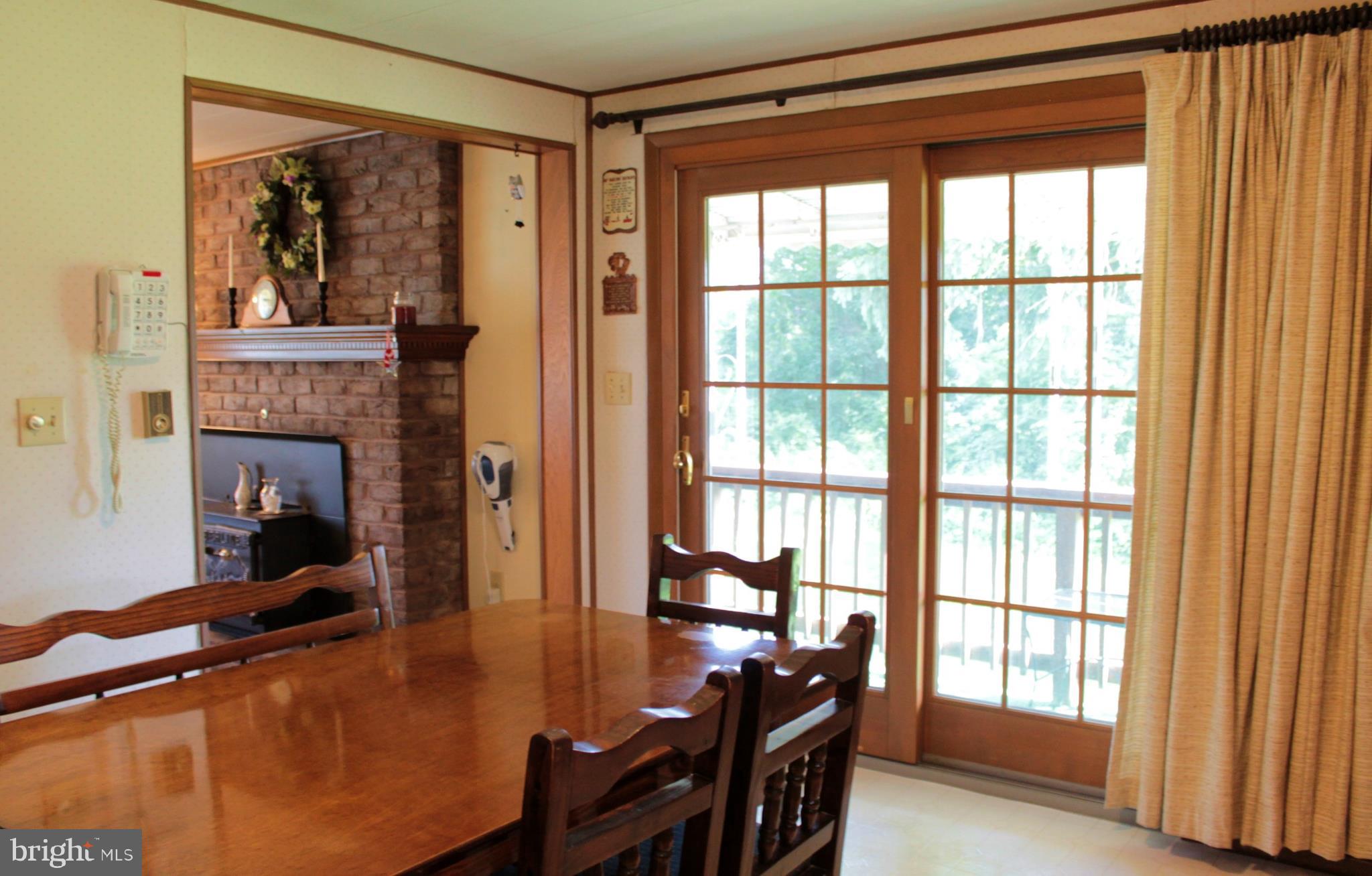929 Linwood Road Hagerstown, MD 21740 - Photo 20 of 42 Kitchen with Sliding Doors to Side Porch
