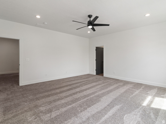 130 East 7085th South, Unit 3 Midvale, UT 84047 - Photo 9 of 30 Carpeted spare room featuring a ceiling fan and recessed lighting