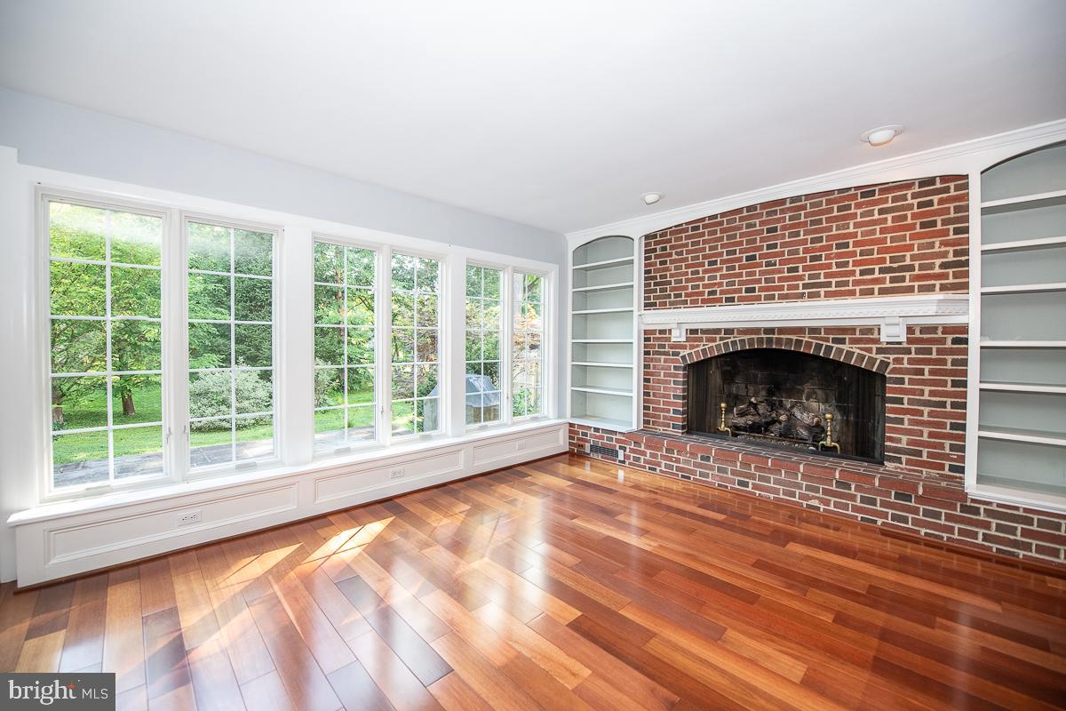 933 Merion Square Road Gladwyne, PA 19035 - Photo 12 of 38 A wall of windows with view of scenic rear yard!