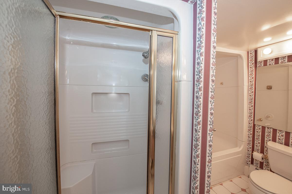 933 Merion Square Road Gladwyne, PA 19035 - Photo 21 of 38 Separate shower and tub in master bath.