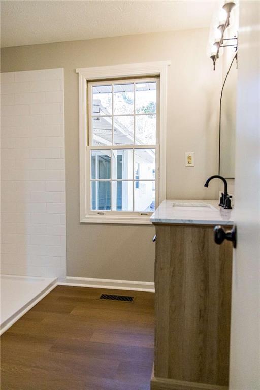 83 Manning Lake Road Rome, GA 30165 - Photo 20 of 26 a bathroom with a sink and a mirror