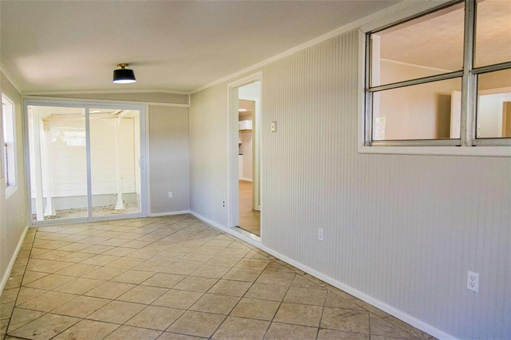 83 Manning Lake Road Rome, GA 30165 - Photo 21 of 26 an empty room with windows