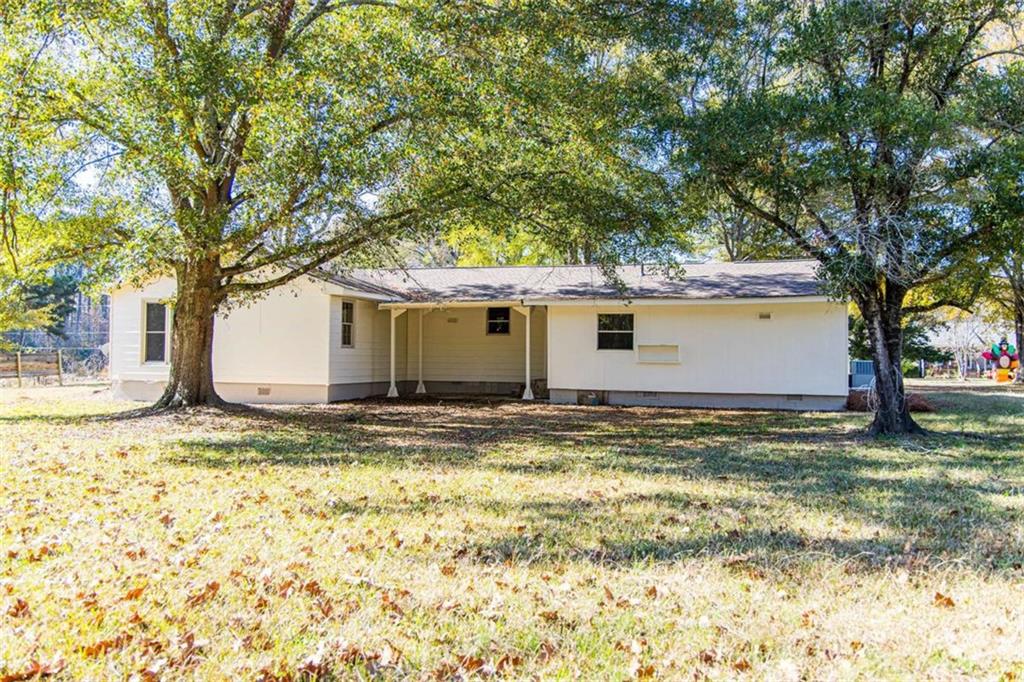 83 Manning Lake Road Rome, GA 30165 - Photo 6 of 26 a backyard of a house