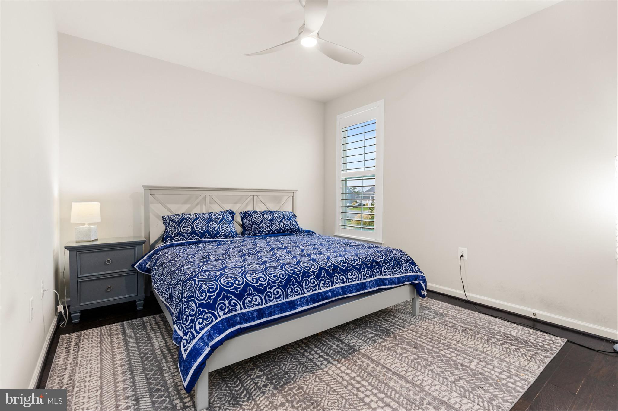 10135 Fast Colors Lane Berlin, MD 21811 - Photo 30 of 63 a bedroom with a bed and window