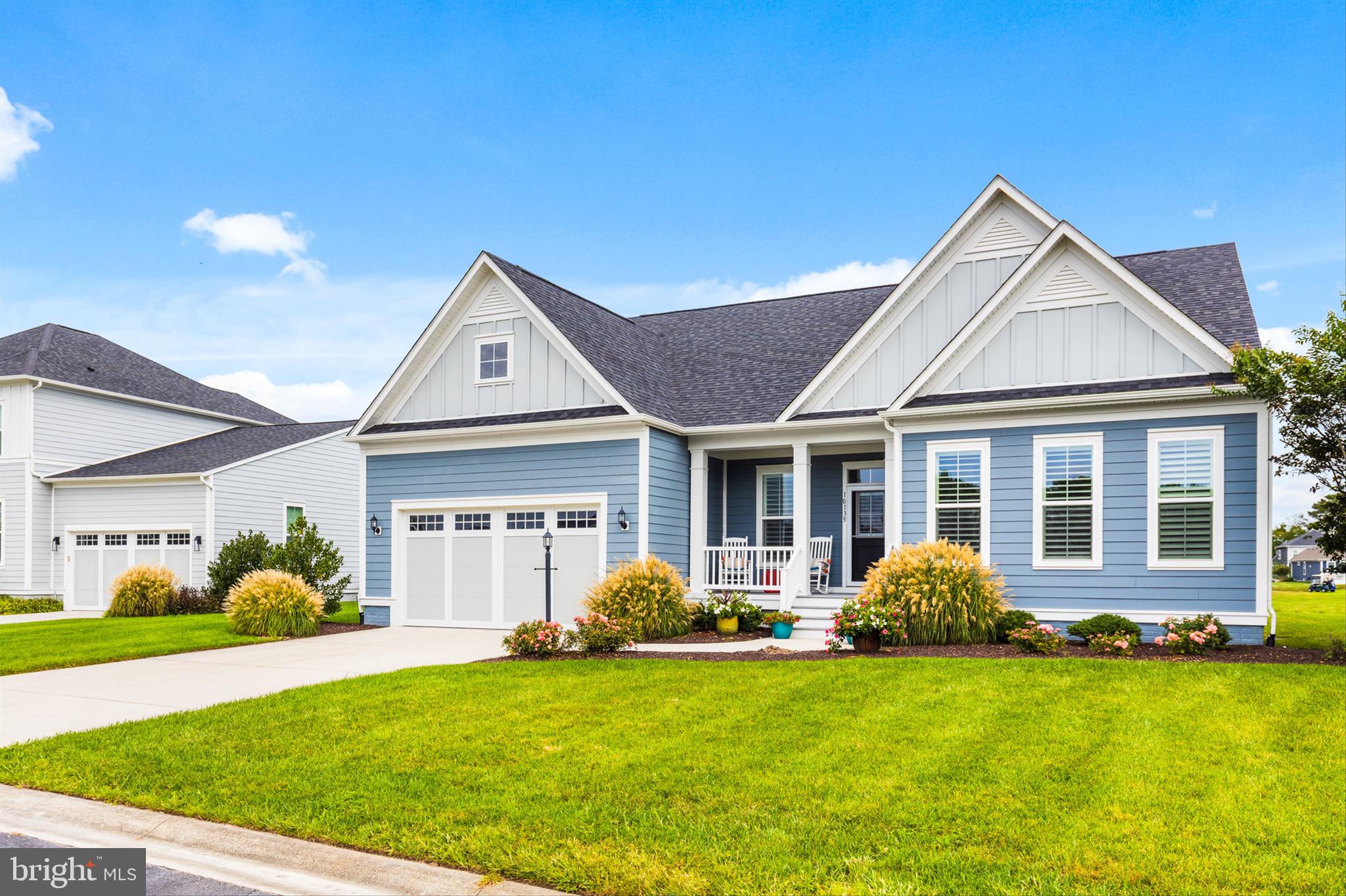10135 Fast Colors Lane Berlin, MD 21811 - Photo 3 of 63 a front view of a house with garden