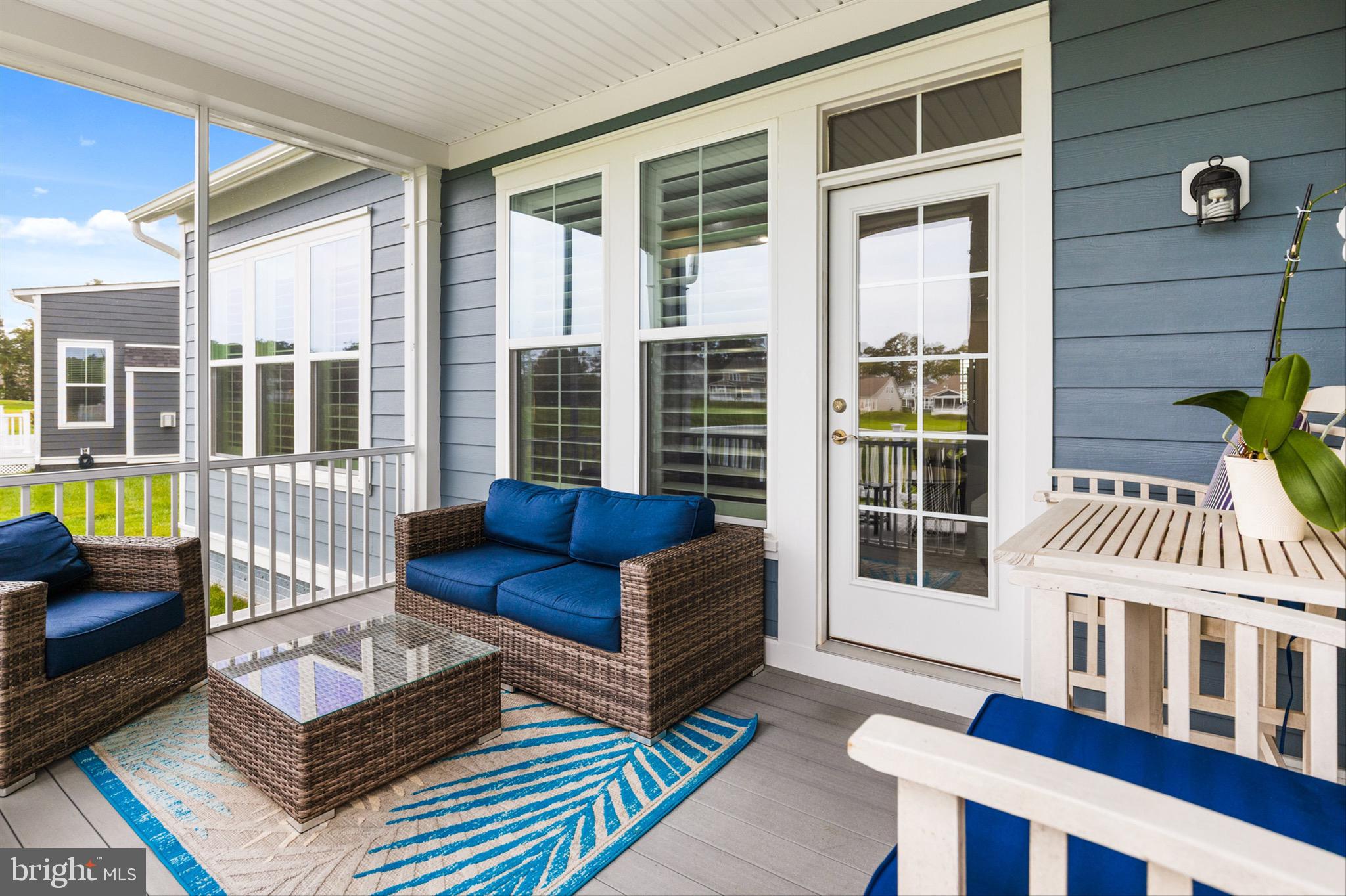 10135 Fast Colors Lane Berlin, MD 21811 - Photo 39 of 63 a living room with furniture and a window