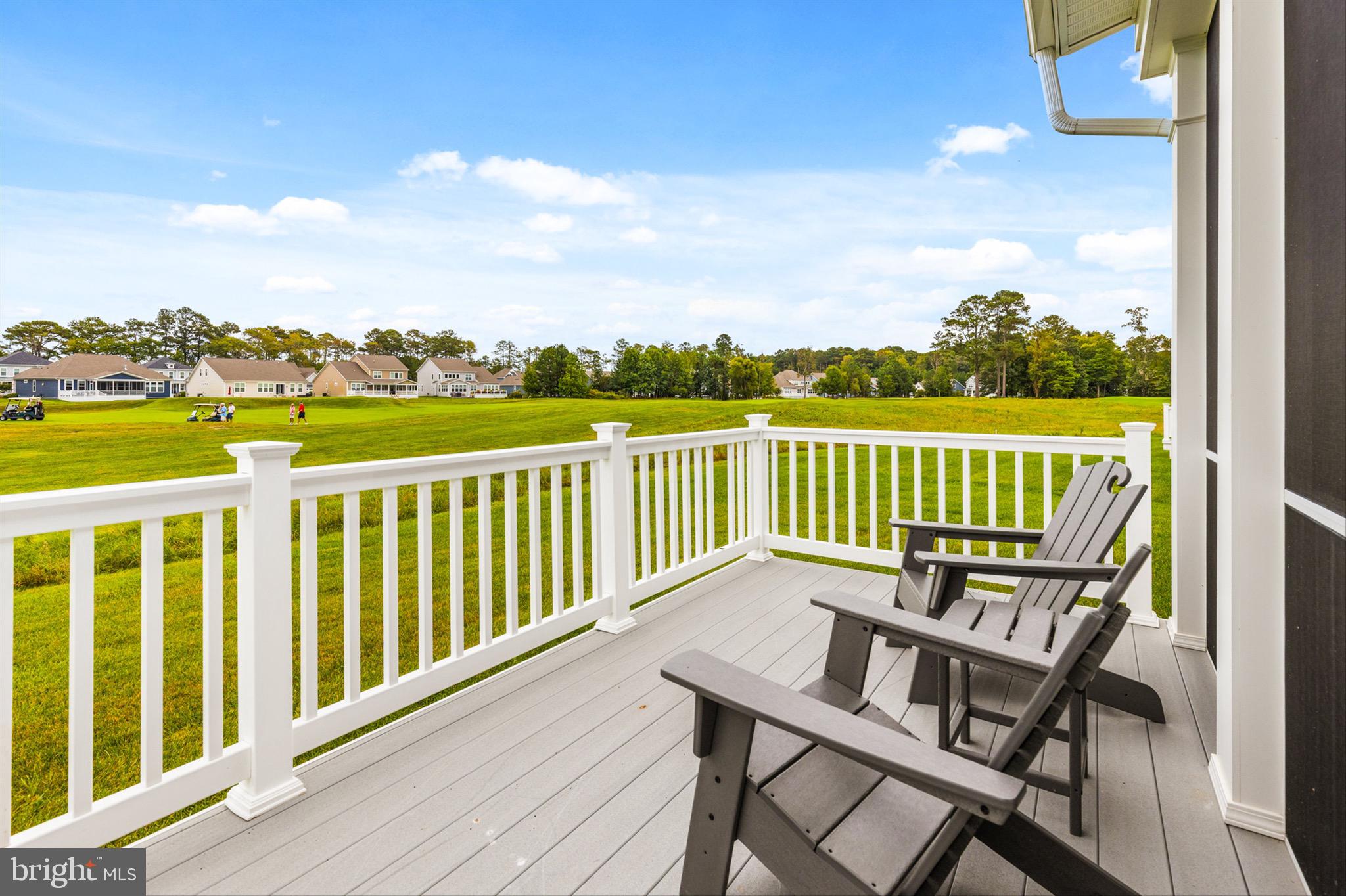 10135 Fast Colors Lane Berlin, MD 21811 - Photo 43 of 63 a view of a chair and table on the deck