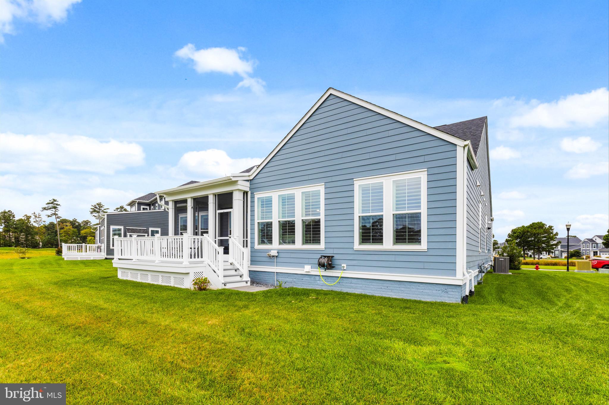 10135 Fast Colors Lane Berlin, MD 21811 - Photo 44 of 63 a front view of house with yard and green space