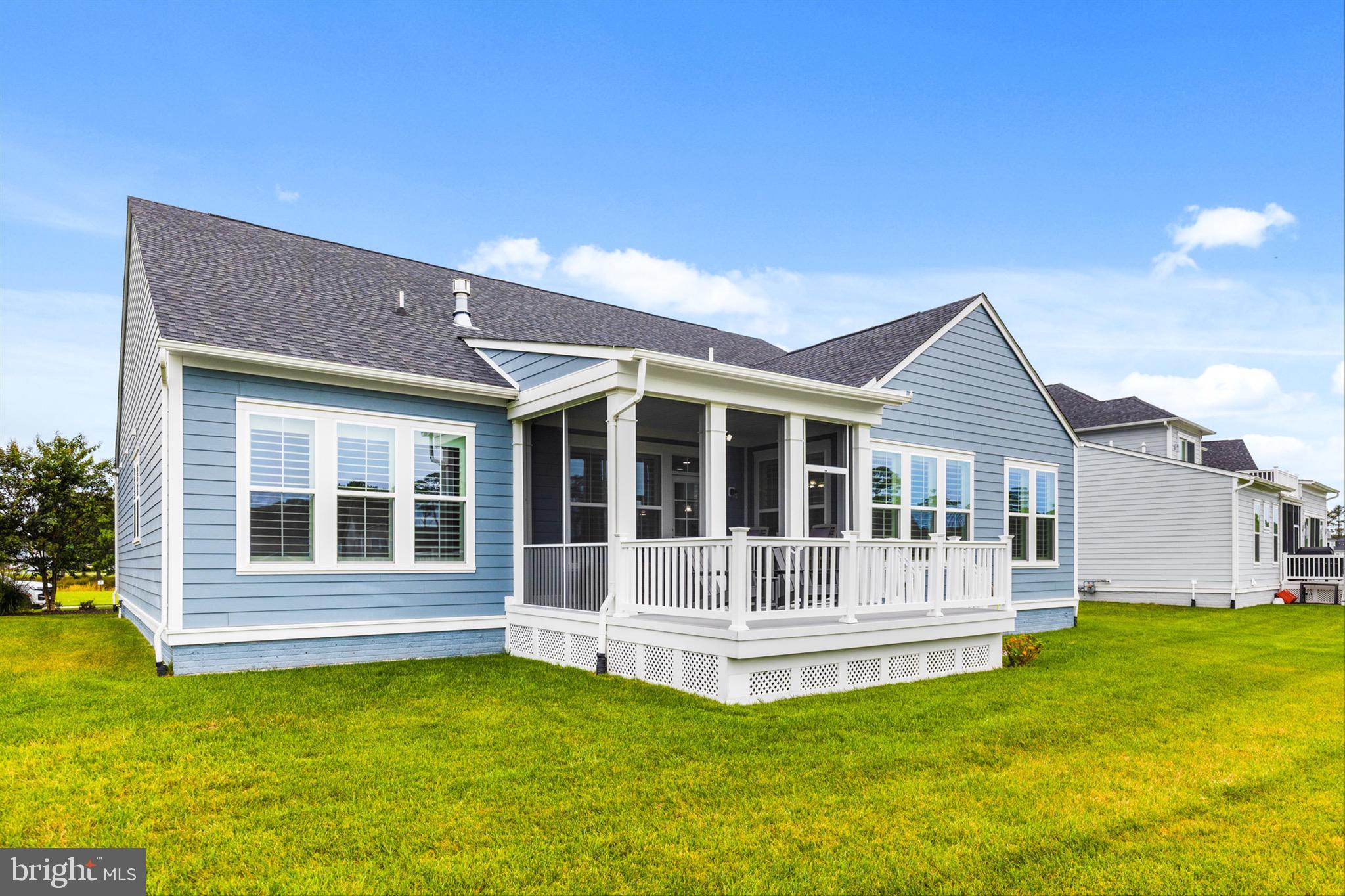10135 Fast Colors Lane Berlin, MD 21811 - Photo 45 of 63 a view of a house with a big yard with wooden fence