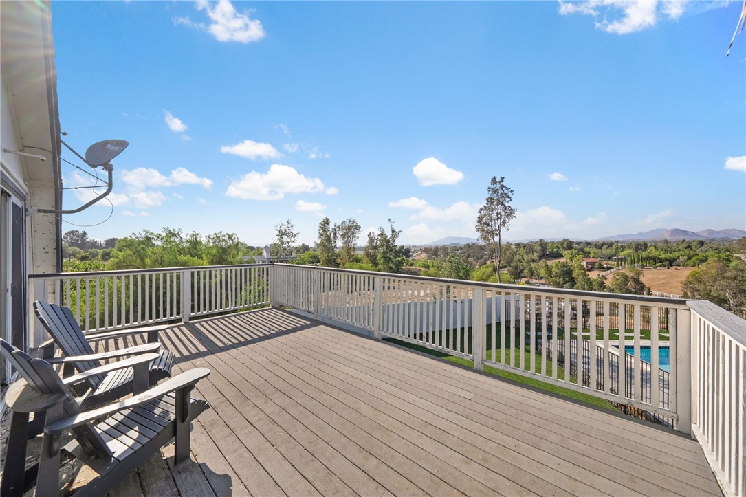35825 Meadow Ridge Road Temecula, CA 92592 - Photo 52 of 75 a view of a balcony with wooden floor