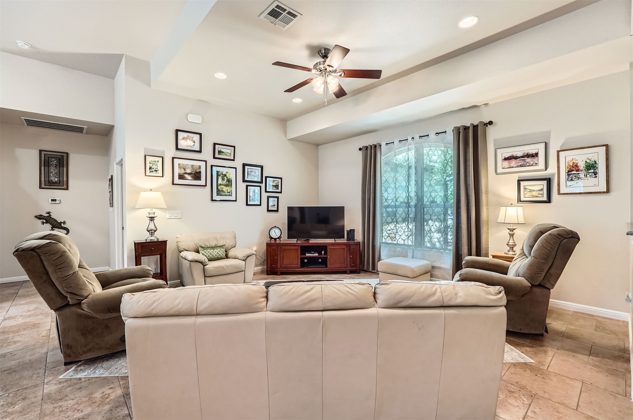 5501 Hitching Post Lago Vista, TX 78645 - Photo 4 of 26 a living room with furniture and a large window
