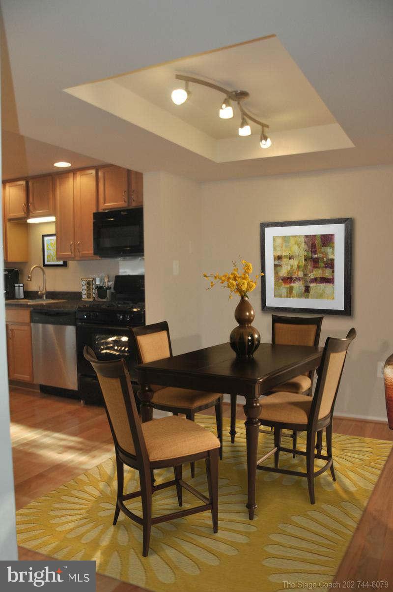 9415 Merryrest Road Columbia, MD 21045 - Photo 5 of 17 a view of a dining room with furniture
