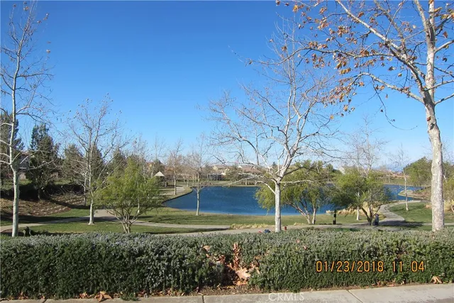 a view of a yard with a house