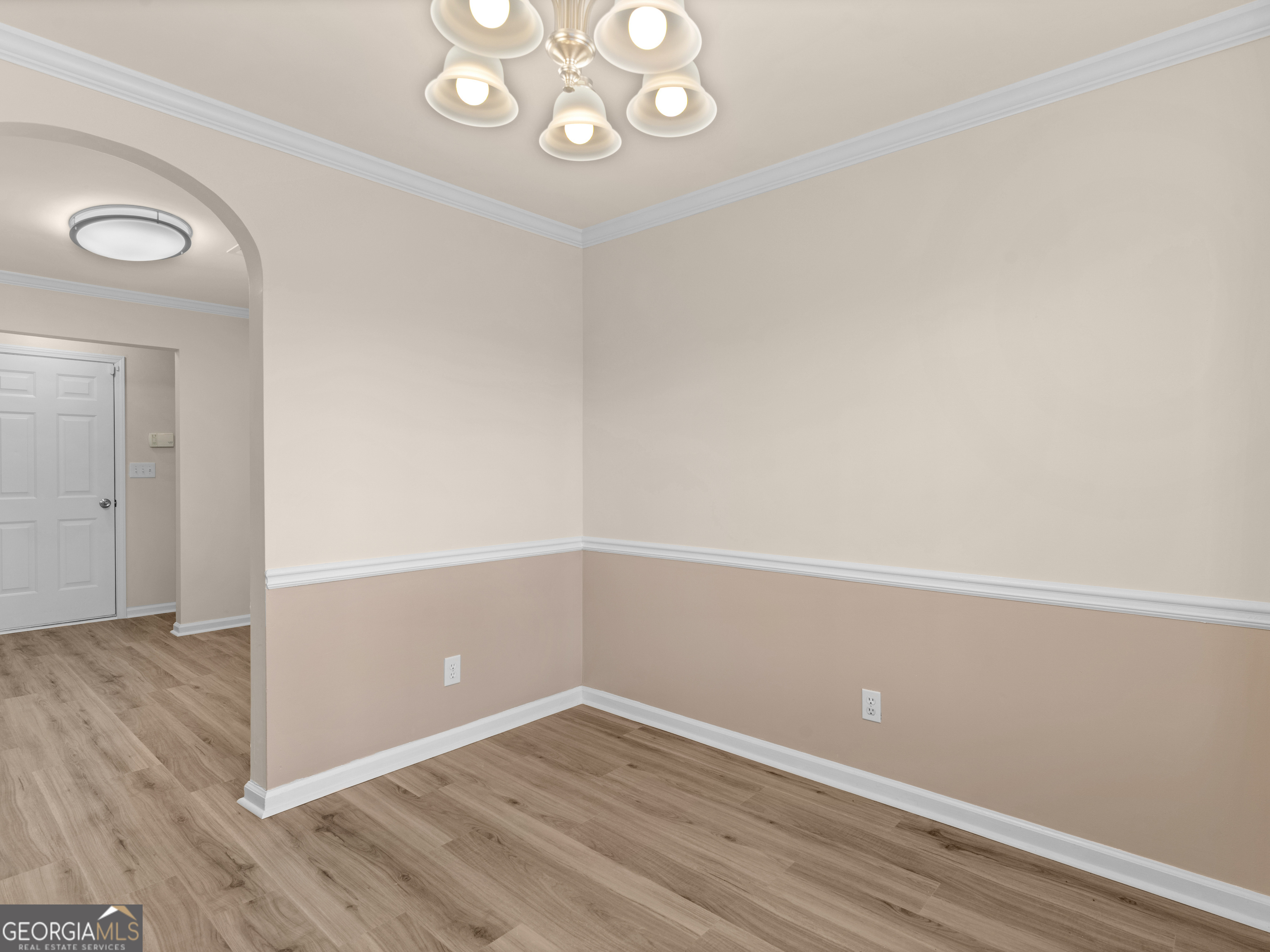 729 Old Stone Court Stockbridge, GA 30281 - Photo 12 of 47 an empty room with wooden floor