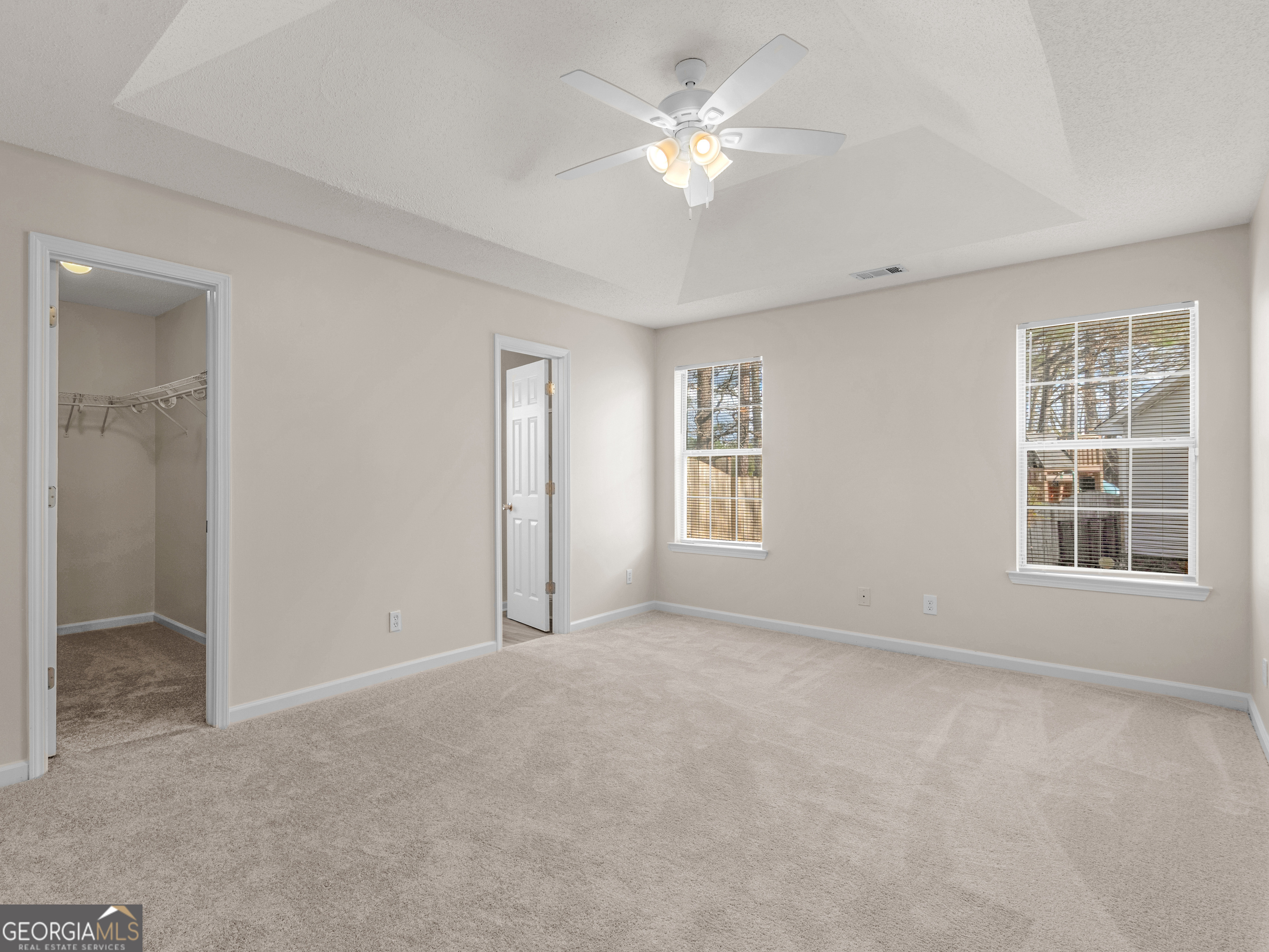 729 Old Stone Court Stockbridge, GA 30281 - Photo 21 of 47 a view of an empty room with a window