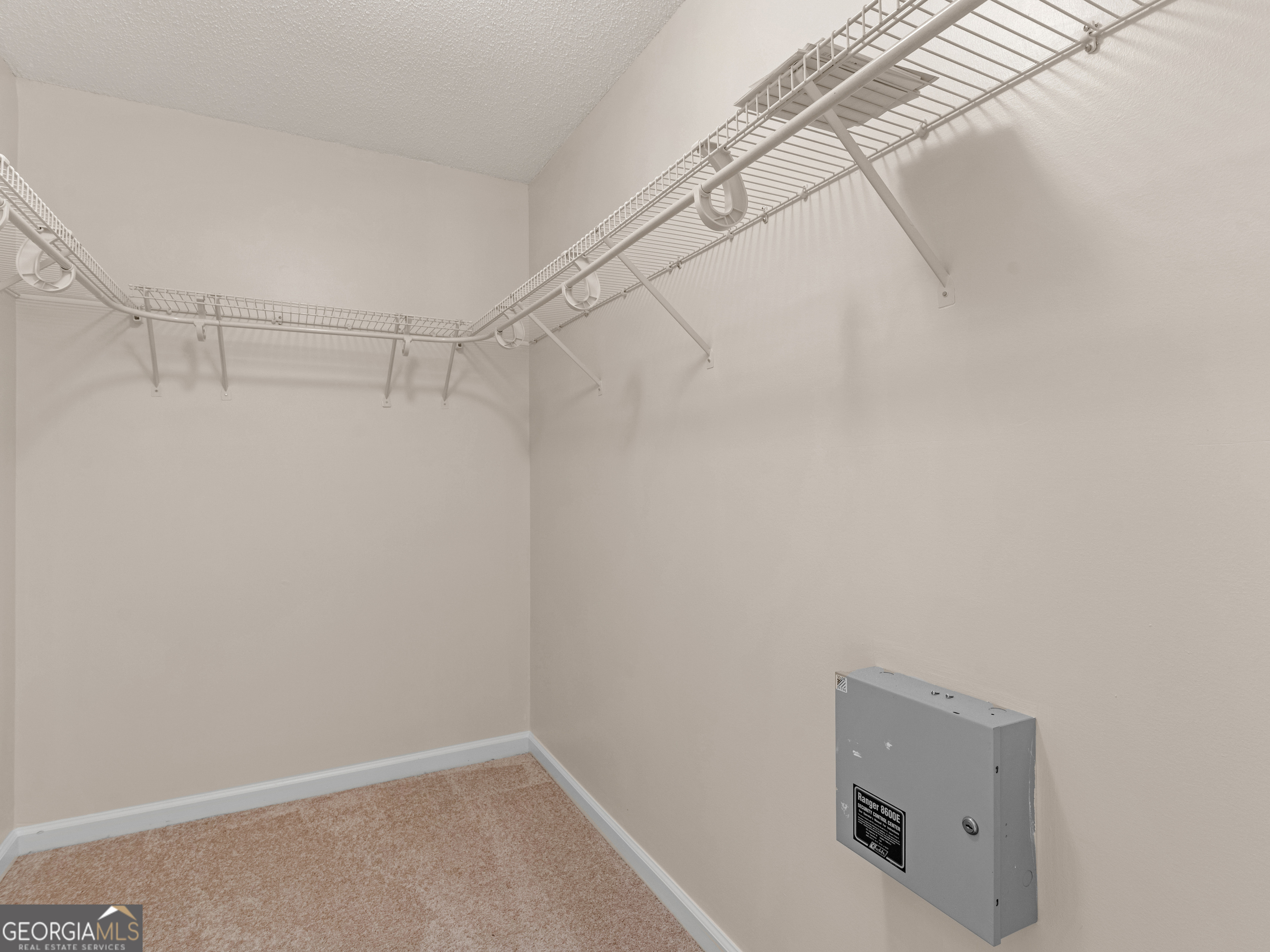 729 Old Stone Court Stockbridge, GA 30281 - Photo 28 of 47 a view of a room with racks on the wall