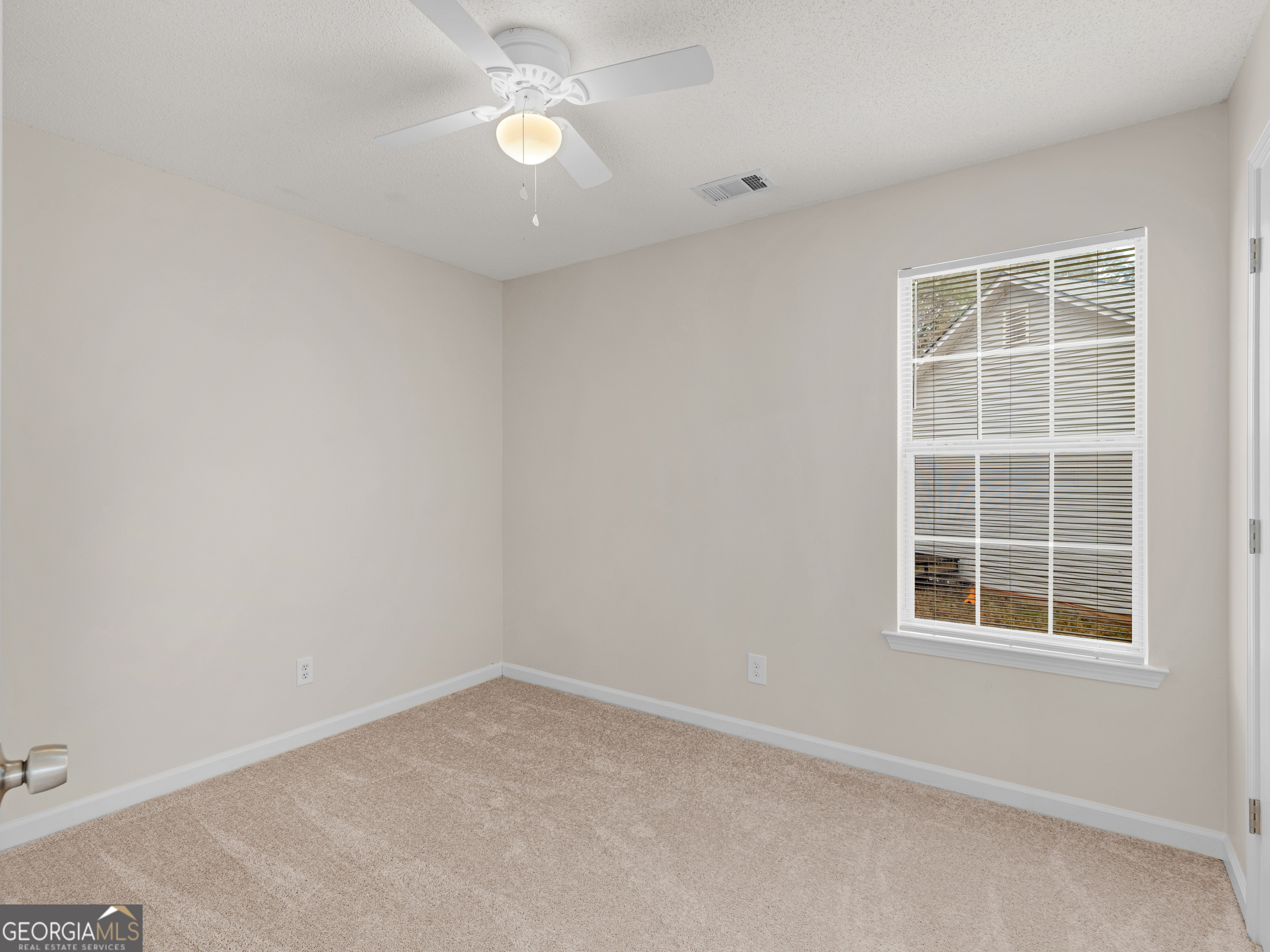 729 Old Stone Court Stockbridge, GA 30281 - Photo 33 of 47 an empty room with a window