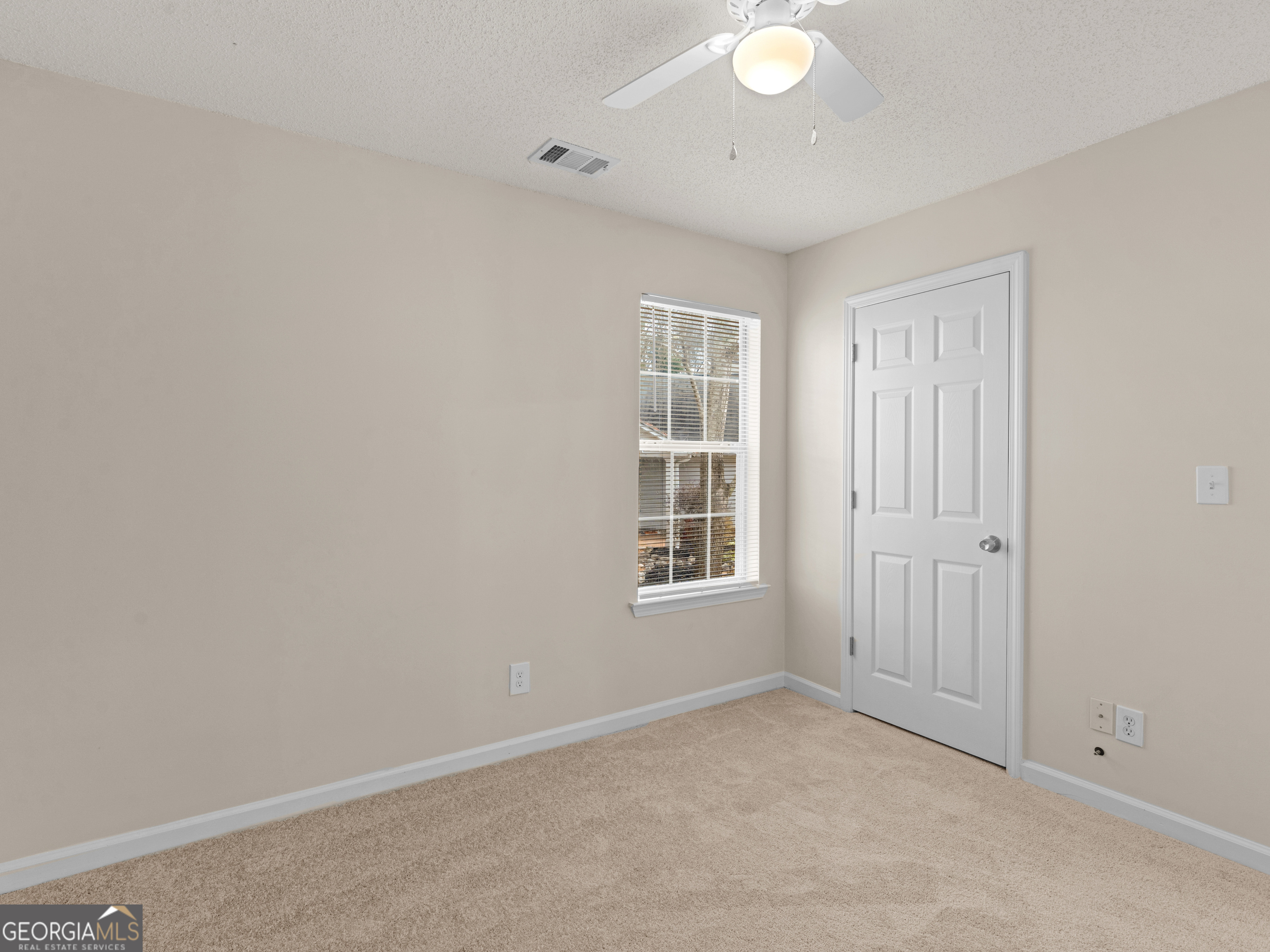729 Old Stone Court Stockbridge, GA 30281 - Photo 36 of 47 an empty room with windows and closet