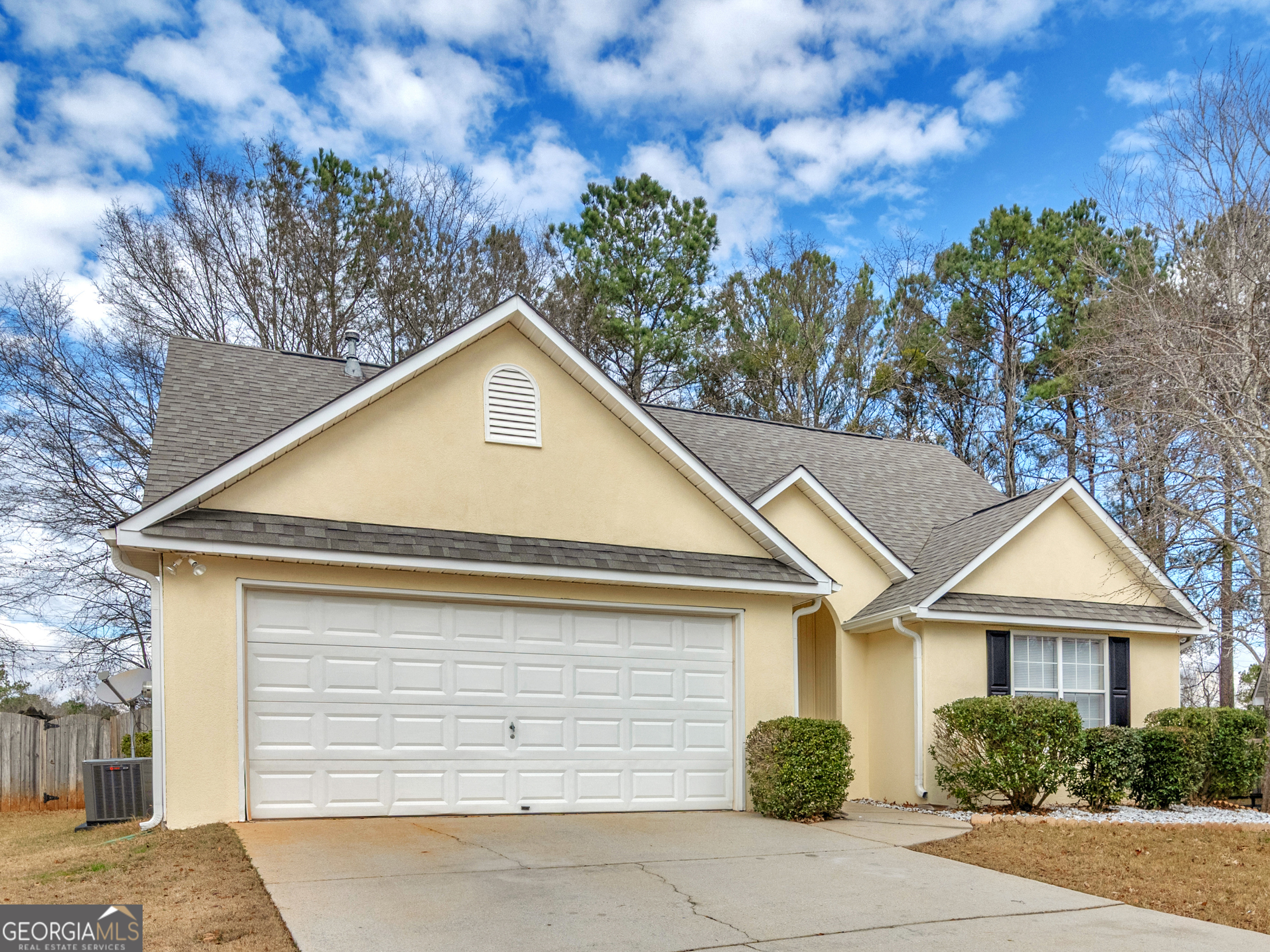 729 Old Stone Court Stockbridge, GA 30281 - Photo 43 of 47 a view of a house with a yard