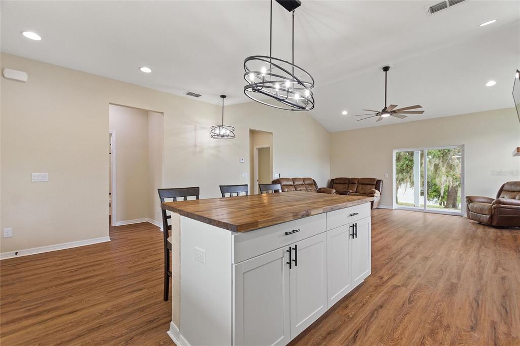 1042 Golden Bough Road Lake Wales, FL 33898 - Photo 13 of 53 a kitchen with a counter space a sink and cabinets