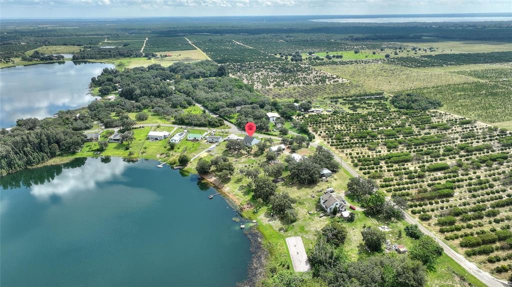1042 Golden Bough Road Lake Wales, FL 33898 - Photo 30 of 53 a view of a lake with a city