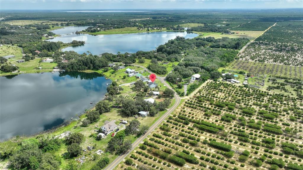1042 Golden Bough Road Lake Wales, FL 33898 - Photo 31 of 53 a view of a lake with a lake