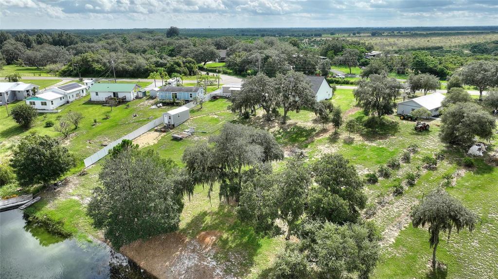 1042 Golden Bough Road Lake Wales, FL 33898 - Photo 43 of 53 a view of a lake with a city