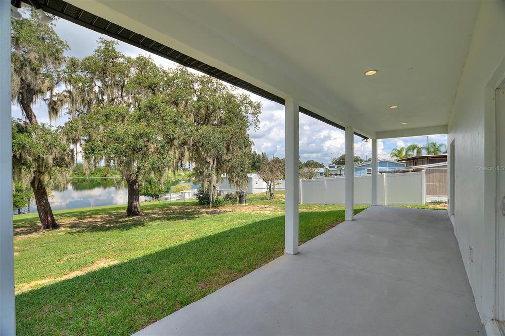 1042 Golden Bough Road Lake Wales, FL 33898 - Photo 8 of 53 a view of a green field
