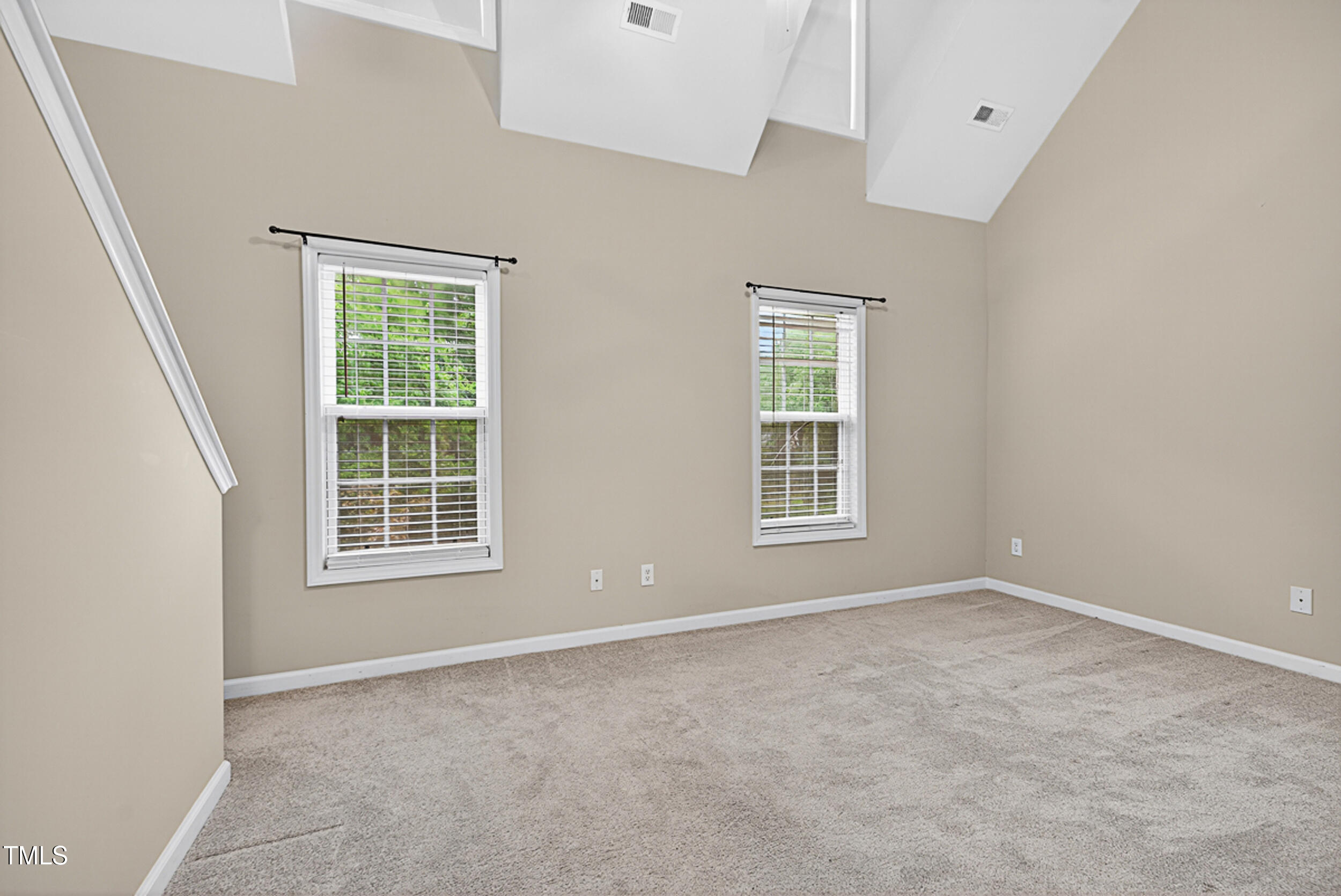 2407 Trout Stream Drive Raleigh, NC 27604 - Photo 19 of 26 an empty room with windows