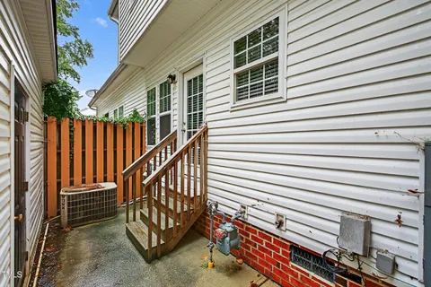 a view of a house with a street