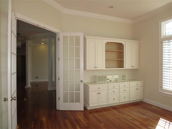 36 Open Space Drive Sandwich, MA 02563 - Photo 11 of 30 a view of an empty room with wooden floor and a window
