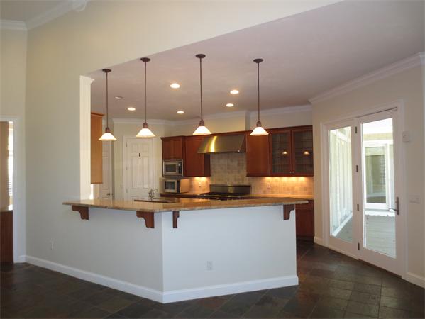 36 Open Space Drive Sandwich, MA 02563 - Photo 15 of 30 a view of a kitchen with a sink and a window