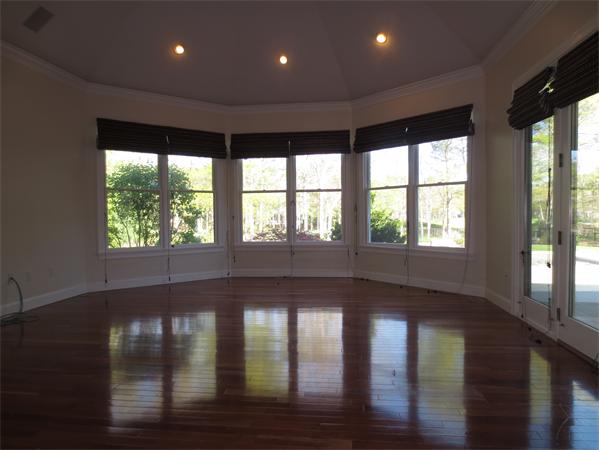 36 Open Space Drive Sandwich, MA 02563 - Photo 18 of 30 a view of empty room with wooden floor and fan