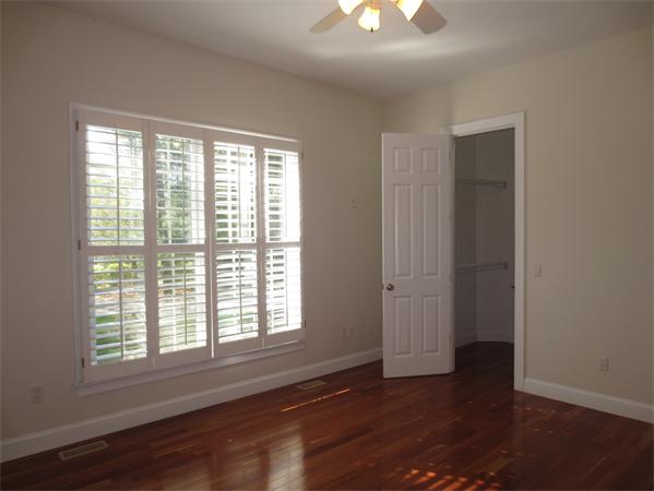 36 Open Space Drive Sandwich, MA 02563 - Photo 22 of 30 a view of an empty room with wooden floor and a window