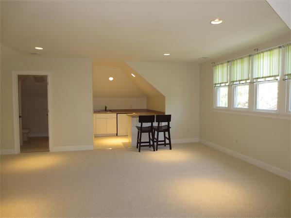 36 Open Space Drive Sandwich, MA 02563 - Photo 24 of 30 an empty room with windows and pillars in it