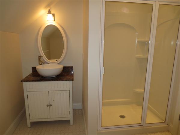 36 Open Space Drive Sandwich, MA 02563 - Photo 25 of 30 a bathroom with a sink and a mirror