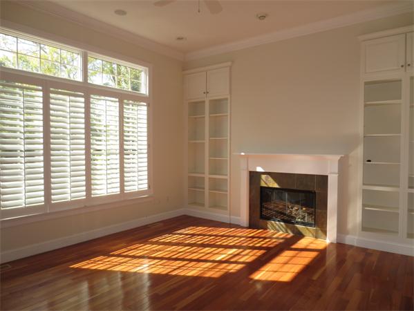 36 Open Space Drive Sandwich, MA 02563 - Photo 10 of 30 a bedroom with a bed and a fireplace
