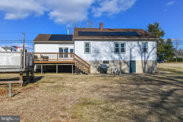 a view of a town with large trees