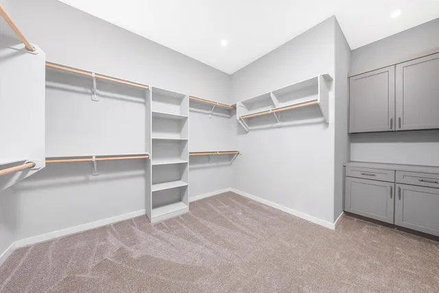 a view of an empty walk in closet
