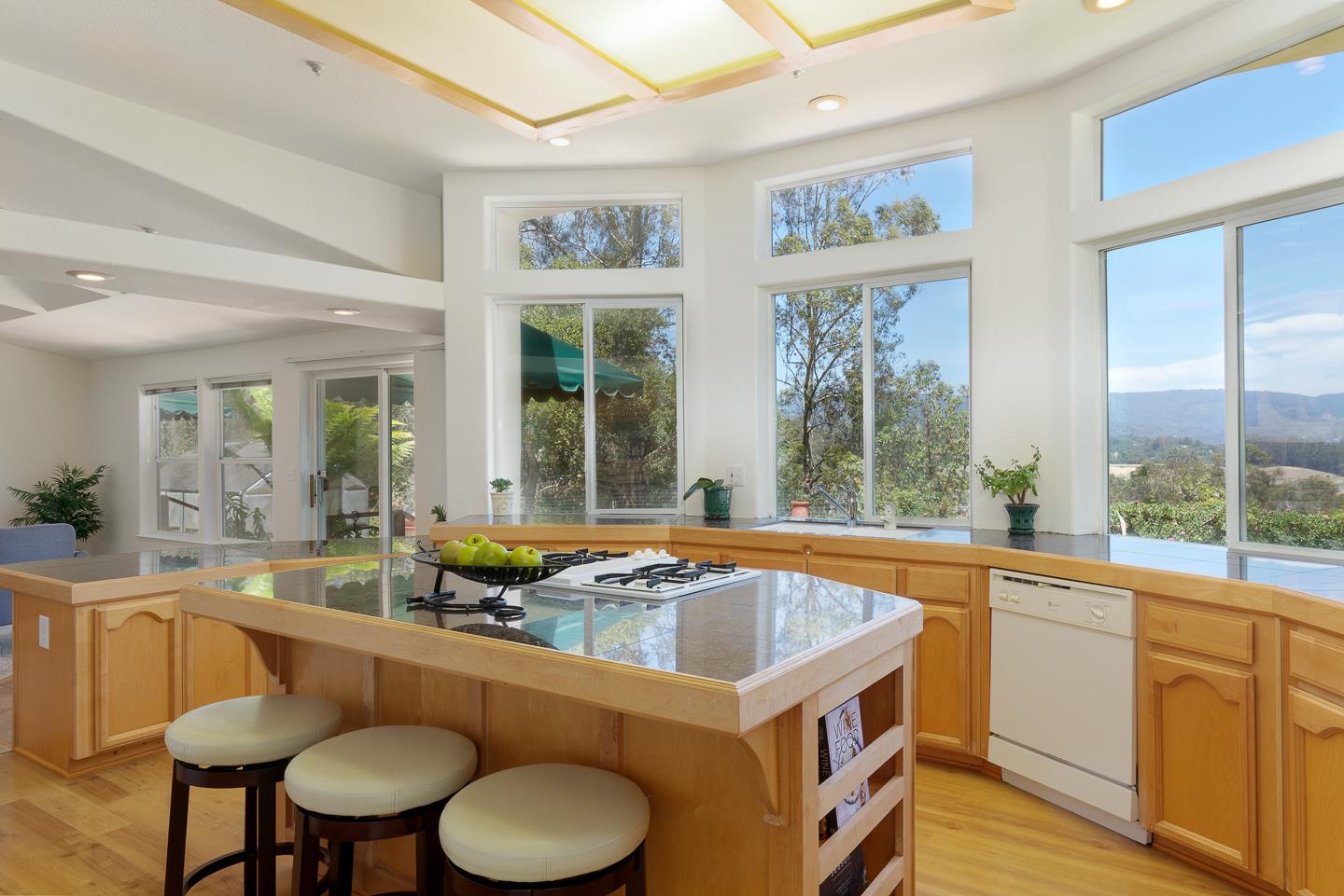 892-894 Calabasas Road Watsonville, CA 95076 - Photo 11 of 53 a kitchen that has a sink and chairs