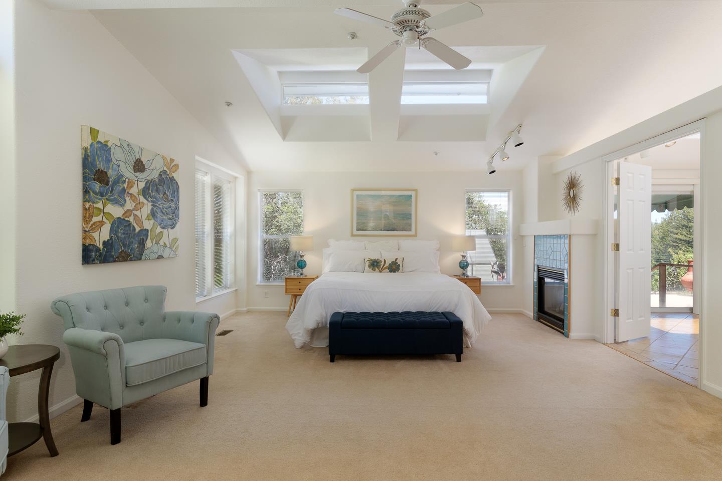 892-894 Calabasas Road Watsonville, CA 95076 - Photo 19 of 53 a bedroom with a bed couch and painting on the wall