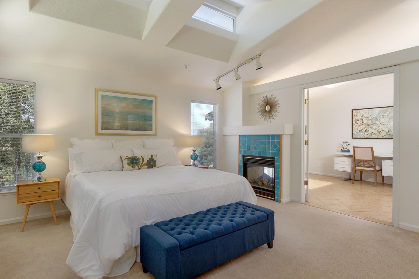 892-894 Calabasas Road Watsonville, CA 95076 - Photo 24 of 53 a bedroom with a bed couches and a fireplace