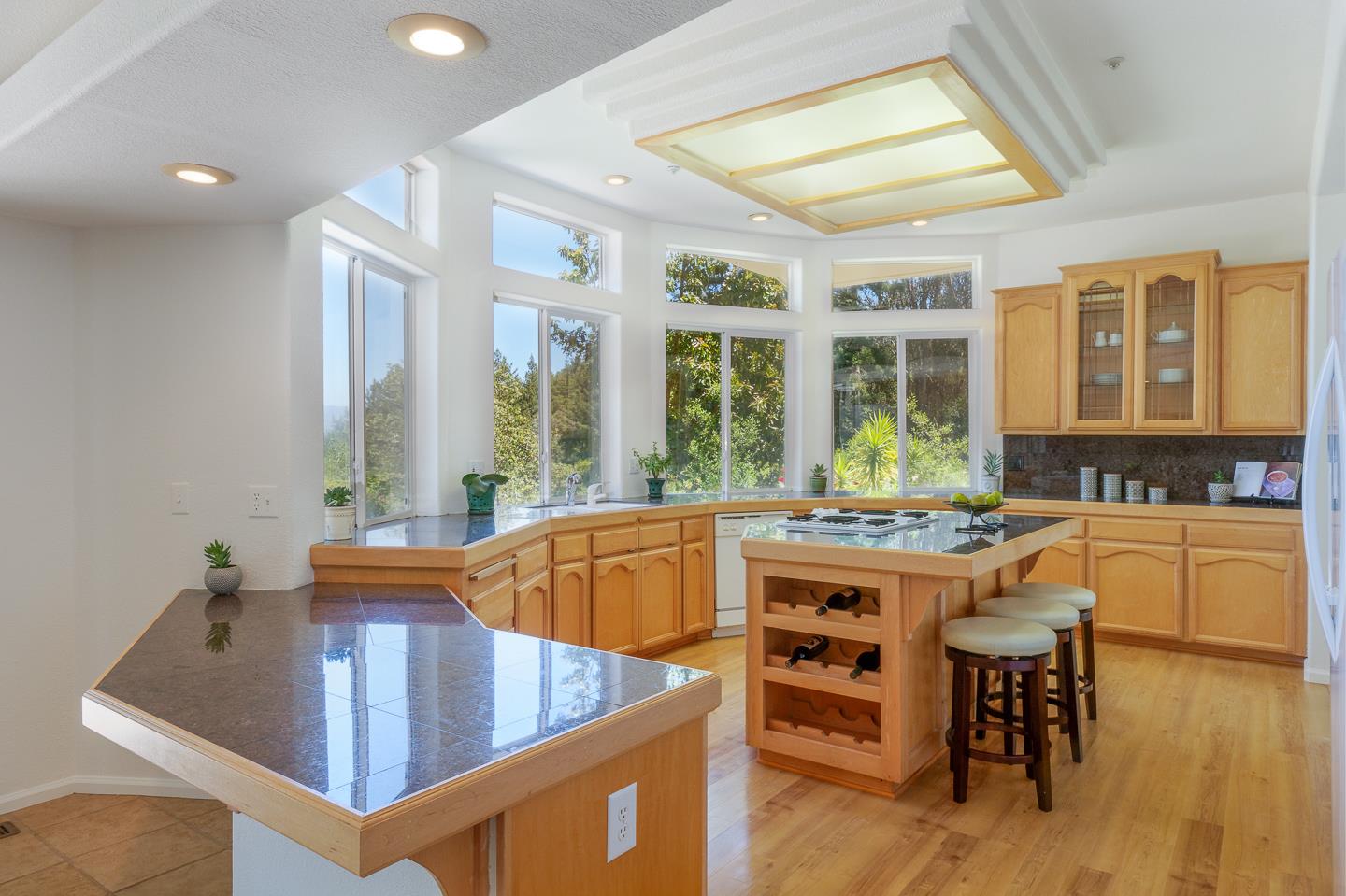 892-894 Calabasas Road Watsonville, CA 95076 - Photo 10 of 53 a open kitchen with stainless steel appliances granite countertop a stove and a refrigerator