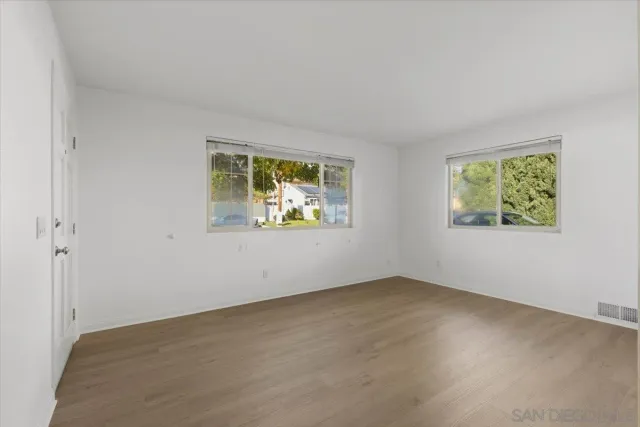 a view of storage and utility room with washer and dryer